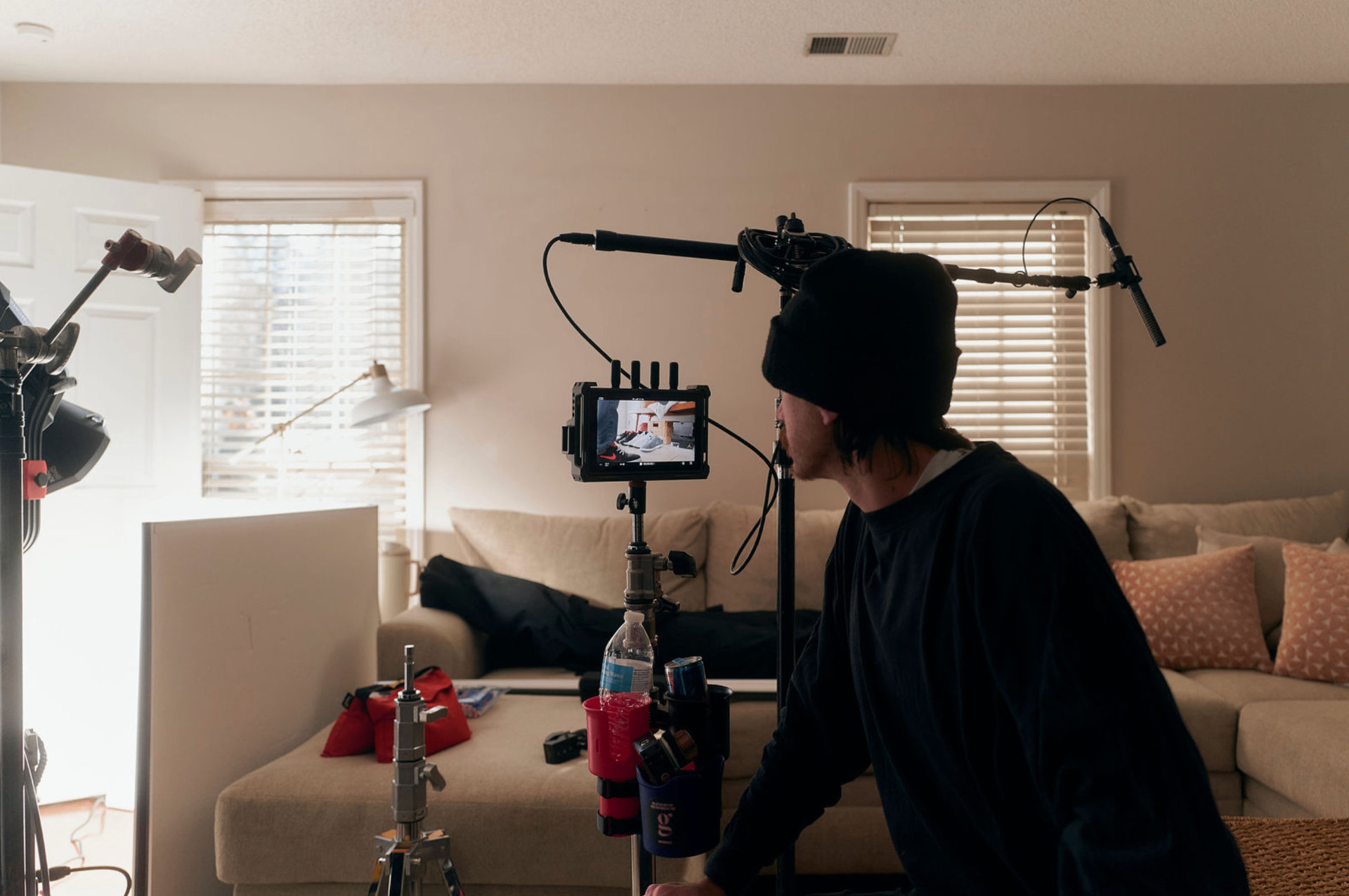 Rack Room BTS — living room setup with monitor